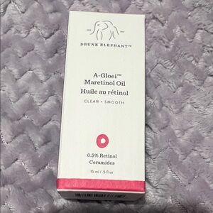 Drunk Elephant A-Gloei Maretinol Oil - White and Red Packaging